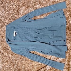 Darker green cardigan